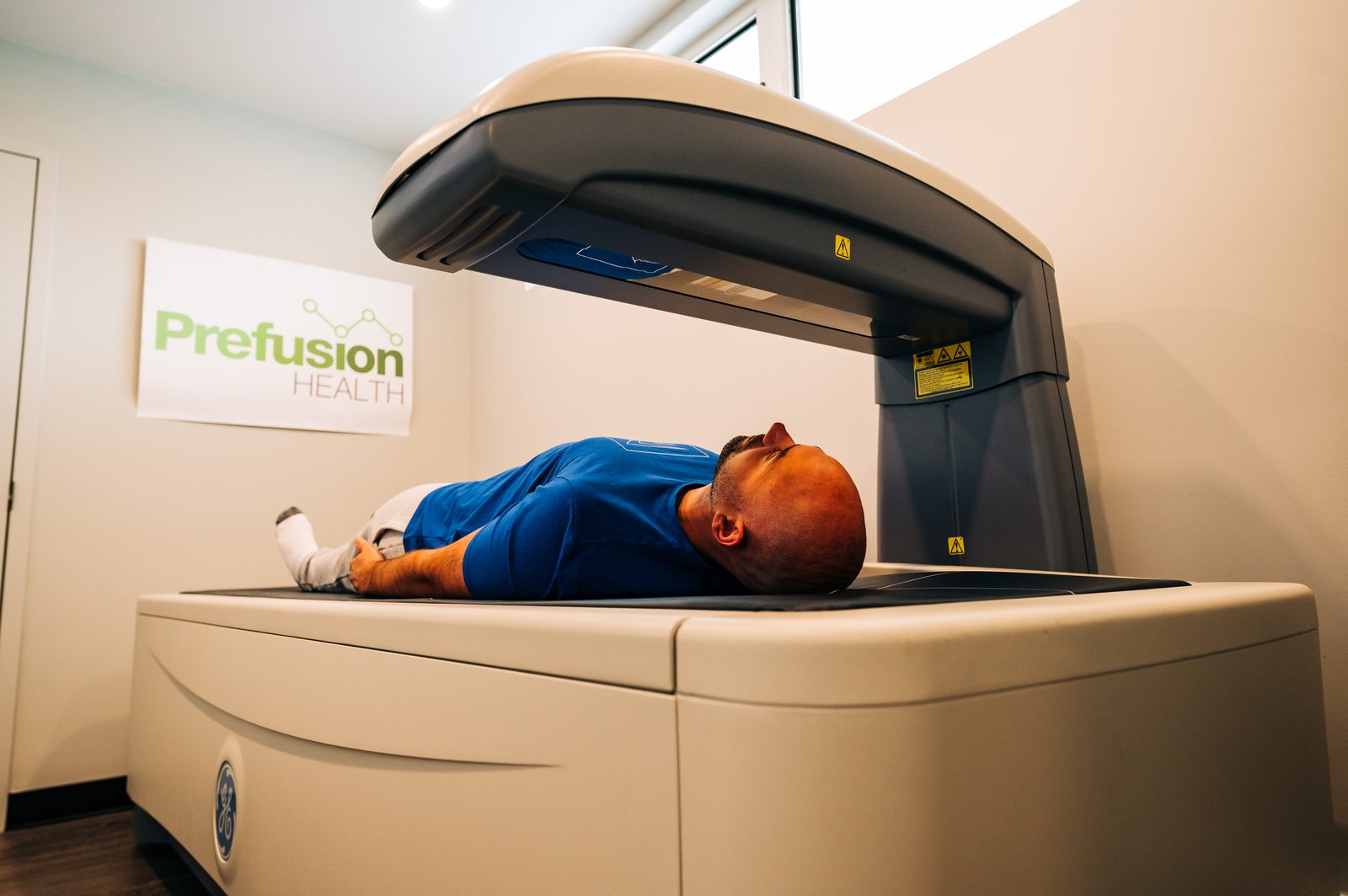 A DEXA body composition scan in progress at Prefusion Health